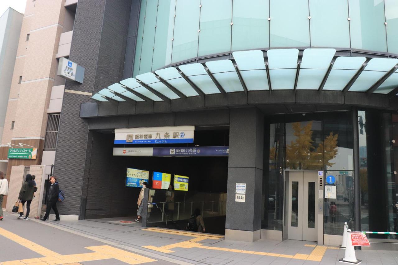 大阪ドーム徒歩10分、九条駅から3分、難波直通6分、海遊館7分、Usj11分 Villa Bagian luar foto
